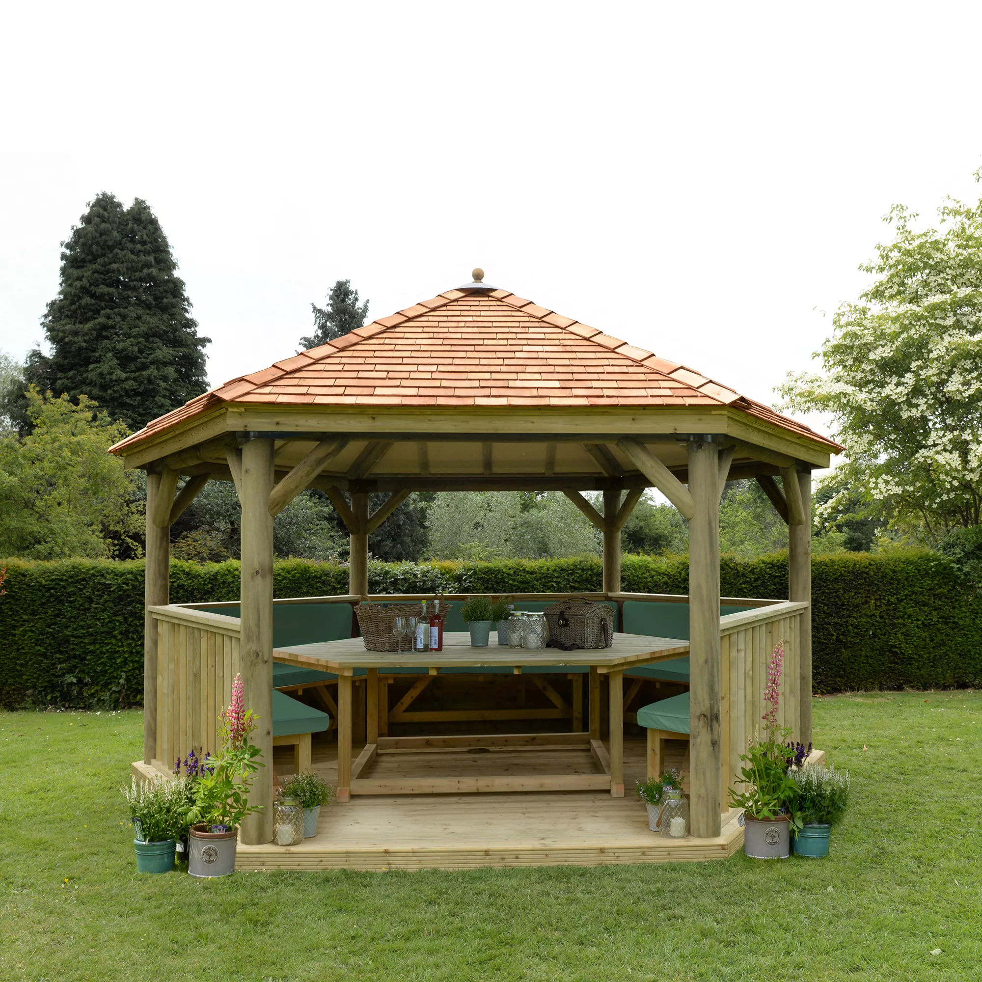 Forest Garden Furnished Cedar Roof Hexagonal Gazebo, (W)4900mm (D)4240mm (Green Cushion Included) 1 Forest Garden Furnished Cedar Roof Hexagonal Gazebo, (W)4900mm (D)4240mm (Green Cushion Included)